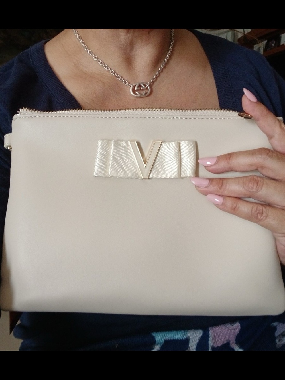 Mario Valentino Cream Clutch with Gold V Emblem